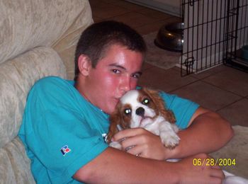 My son, Ryan, and his Cavalier King Charles Spaniel puppy, Cash.
