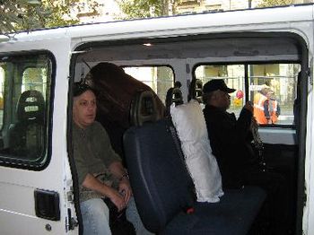 Larry Ochiltree & Ron Brooks gettin' ready for the ride to another concert venue in Italy--my "comfort" pillow in the middle.
