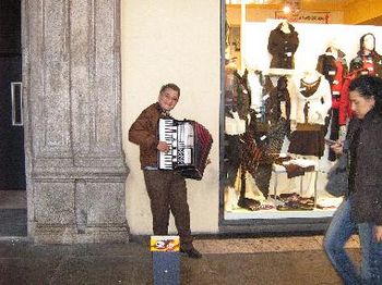 accordian player doing a solo gig--kept repeating "tangerine"
