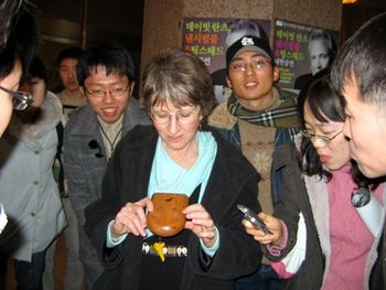 Nancy sharing A North Country Workshop tenor ocarina with Taegu Ocarina Club
