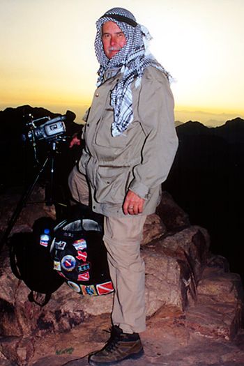 "Paulie of Arabia" catches the sunrise from the summit of Mt. Sinai during the 2002 filming of "Egypt - Karnak to Coral Reef." Photo: Randy Saletnik
