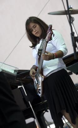 Eliana Athayde holding down the tumbao, 2006<br><small>Photography: Tom Ehrlich</small>
