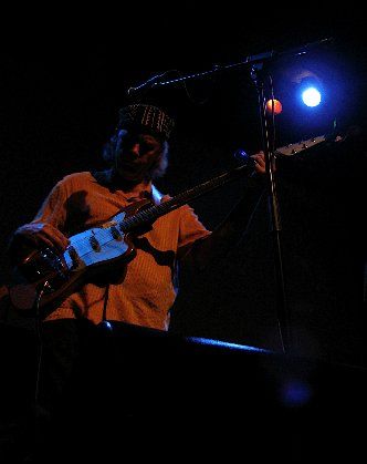 Sam playing Teisco baritone at Mystic Theater (photo by Laura Muckenhoupt)
