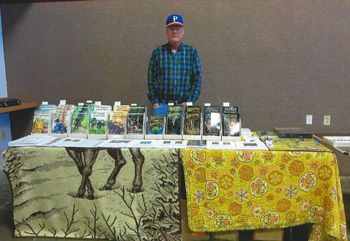 Bill with a Display of his Bucktail Books & Game
