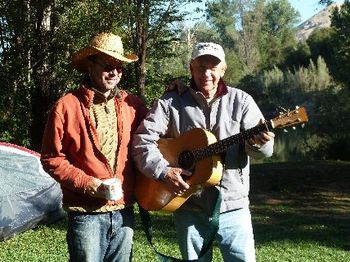 Mike and Dad at the American River Music Fest, Dad pretending to play the guitar he gave me as a kid! It's 32 years old and we're a tad older than that
