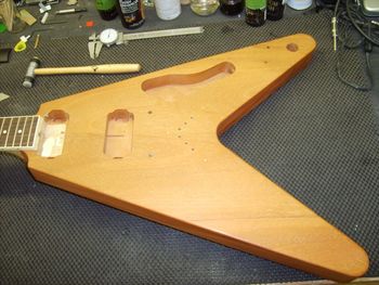 Here, I am prepping a Hamer Vector Flying Vee for a fresh, custom-mixed nitrocellulose lacquer finish...
