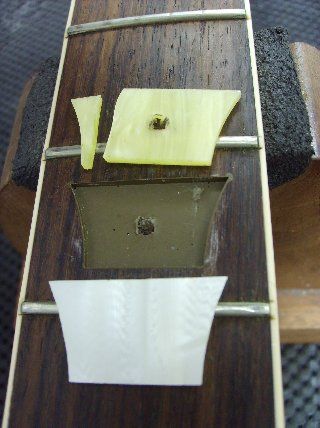 While the new inlays closely match the outlines of the old ones, some minor reshaping of the inlay and cavity is necessary.
