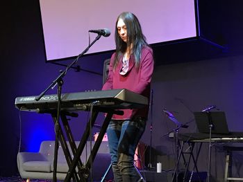 Kimberlee M Leber Performing a Heartfelt Song on Her Yamaha MOX6 Keyboard
