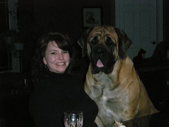 Cricket sharing a glass of wine with her friend Holley at New Years
