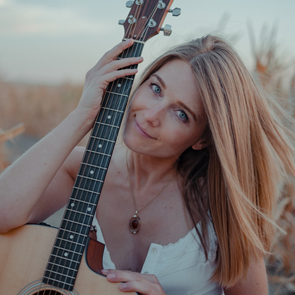 Portrait of songwriter, Darcy Nelson in album art for her single, "See Your Face."