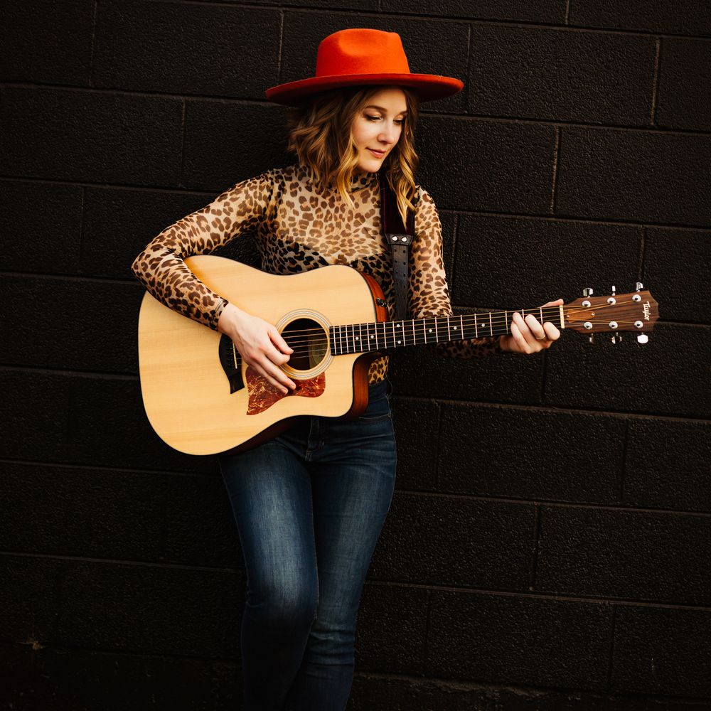 Denver, Colorado based Singer Songwriter Darcy Nelson.