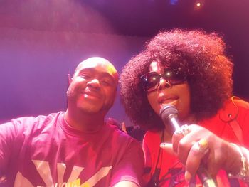 DJ Tron behind the scenes with Angie Stone
