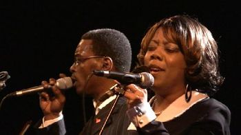 Michael Robinson and Jean Carpenter duet on "Forever Free".
