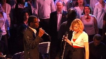 Michael Robinson and Natalie Gond sing "Walking a Wounded"
