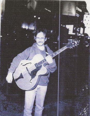 1999, New York City. A Monday night on Times Square, dark with all the Theatres closed.
