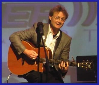 Musical Humorist Greg Tamblyn on stage