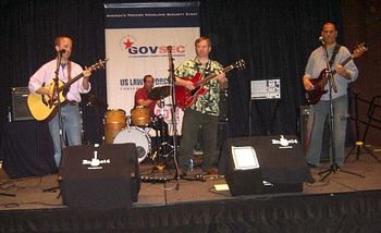 GOVSEC 4/26/06: Despite looking pretty relaxed here, Engine14 fills a room the size of an airplane hangar with music..Washington Convention Center rocks!
