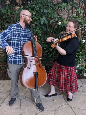 Fiddles and cello are the heart of the San Francisco Scottish Fiddlers' sound. Thomas Dewey and Caroline McCaskey get in the spirit for the group’s annual spring concert series. Credit: Emily Parsons
