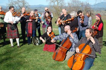 Members of the San Francisco Scottish Fiddlers get into the highland spirit for their concerts coming up in May. Credit: Caroline Testard
