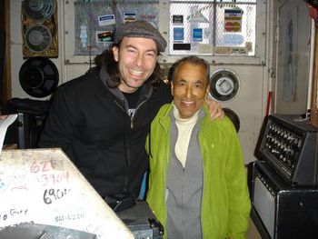 Heath De Fount-Haberlin and jazz great Eddie Duran, guitarist for Billie Holiday, at Real Guitars in San Francisco, California.
