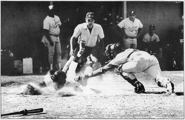 Heath De Fount-Haberlin sliding into home headfirst while playing for  the College of Marin Mariners in 1989.

