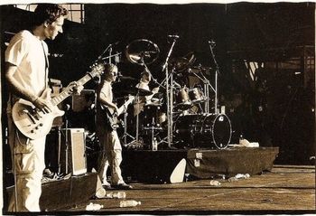 Chris Chaney and Gary Novak perfoming with Alanis Morissette at Woodstock
