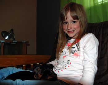 My grandaughter Payton came over to see the puppies today.  I could hardly get her away from them!!!

