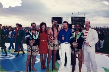 April Gislason, Morry, and Duncan Meiklejohn with weightlifters from Tonga at the closing ceremony.
