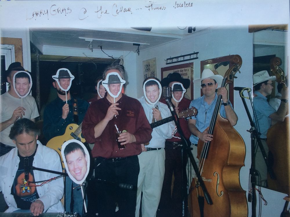 The Guys surprised me and held Lari-Gras instead of Mardi-Gras at the Cellar. They apparently handed out these photos to the 50+ people in the audience and then all held them up together. Very odd and flattering. 