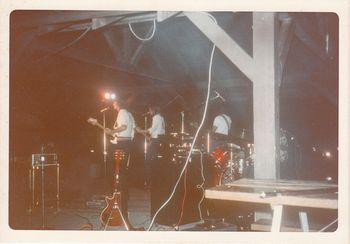 Shoes play under the pavillion in Dwight, IL during Skip's first gig with the band in early fall of 1976.
