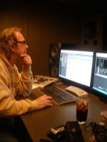 Jeff monitors the software while recording a track for John's song, "I Thought You Knew".
