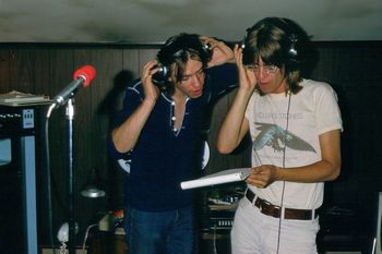 Jeff and John work on some backing vocals at La Cabane for the Bazooka sessions during the hot summer of 1975.
