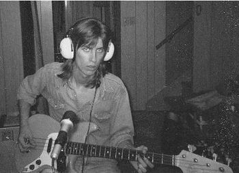 John with his Fender Musicmaster bass in 1974.
