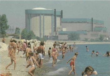 The Zion Nuclear plant in the background on the sunny beaches of Illinois Beach State Park in Zion, IL.
