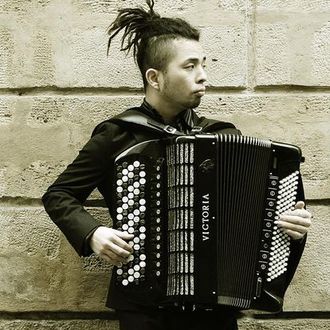 TACA was born in Okayama, Japan, in 1977, at the age of 9 Taca started playing the accordion. He moved to Italy in order to improve his talent when he was 20 years old. The following year, he moved base to Paris In 2008, he released his debut album, “The Valley of the Wind/La Vallee du Vent”  His music displays influence from Japanese music, tango, Brazilian music  and the perfume of Paris