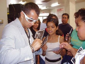 Sidow Sobrino signing autographs for his fans
