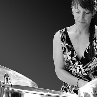 Dawn Hendrickson - Solo Steel Drummer - Instrumental tropical and popular favorites. Founder of Tropical Music International.