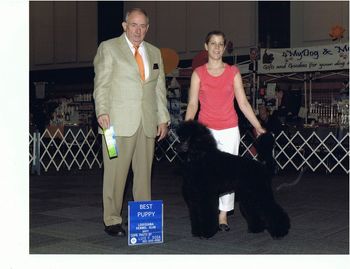 Giselle and I taking Best Puppy in New Orleans, LA. It was our 1st win and 1st photo together!
