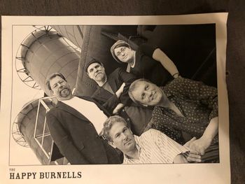 The last Happy Burnells lineup, 2005 (standing: Gary, bassist Mike Krischke, guitarist/singer Brooks Brown; kneeling: drummer John McNutt, Mark)
