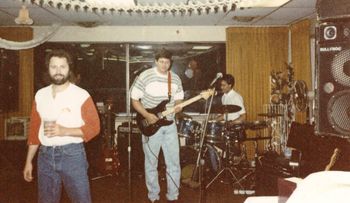 From the way-back machine... Setting up with Jim Warner and Craig Young of The Warner Young Band sometime in the late 80's, as evidenced by my long-deceased '72 Stratocaster and those snazzy harvest gold draperies.  Not pictured:  the late, great John Coulter.
