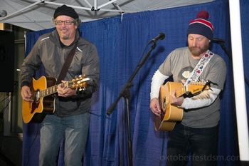 Braving the elements -- Early autumn outdoor shows can be a crapshoot weather-wise, and this photo proves it.  My talented friend Brian Congdon shared the stage with me as we brought some warmth to an otherwise chilly evening at Des Moines Oktoberfest downtown in 2018.
