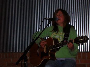 Dani rocks - My daughter playing and singing in 2006 while she was still in high school.  All grown up now and still rockin'.
