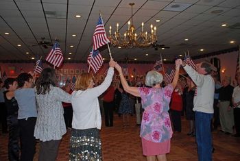 We all join hands and sing along with the incomparable Kate Smith and "God Bless America"!
