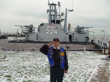 William has contributed much over the years in maintaining the USS COD and the grounds. He took it upon himself to build and erect the flagpole ten years ago, as seen in the next picture. Oh, by the way, he was 77 years young at the time!!!
