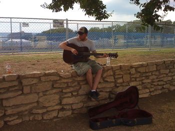 Playing songs of the sea in Riverside Park in Austin, TX in the shadows of Wholefoods world headquarters
