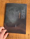 Lyrics Book - Cold Waves Divide Us