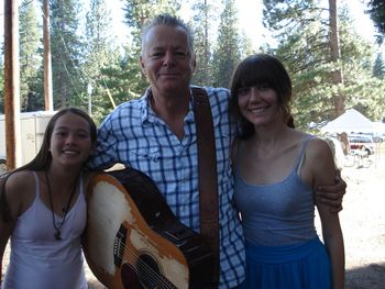 In the arms of the angels. Tommy Emmanuel with AJ and Molly.
