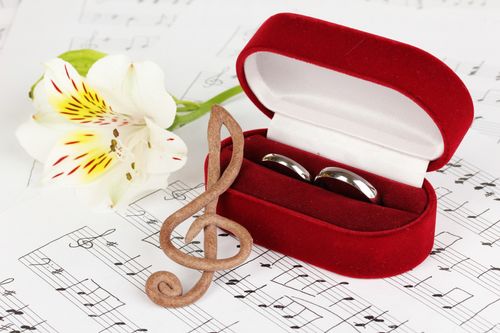 wedding rings on sheet music