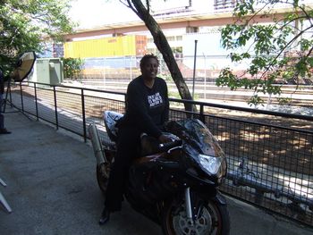 Toi Huggins sitting on her high powered bike.
