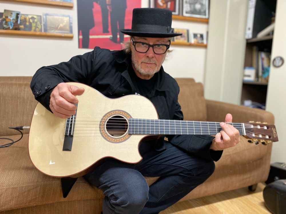 Simon Campbell with his Fylde Classic guitar handbuilt in Cumbria by Roger Bucknell OBE and his team